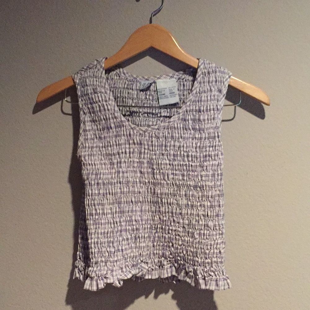 purple no sleeve shirt